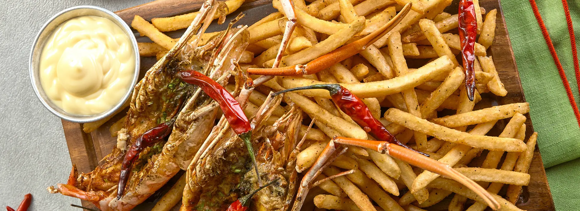CAJUN FRIES & GRILLED PRAWNS